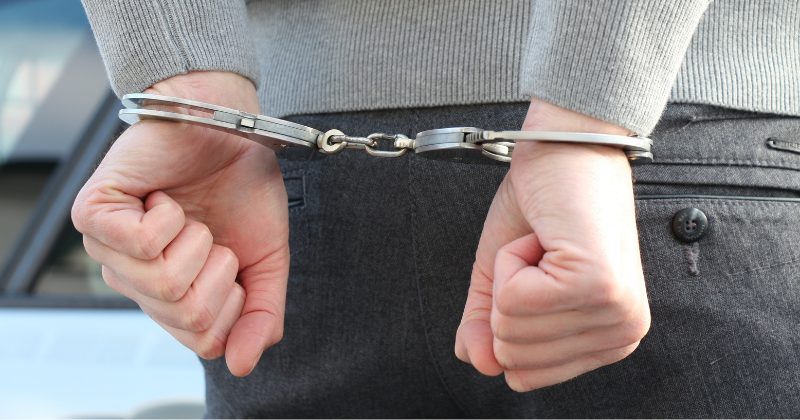 Man in handcuffs: Crimmigration: What Is It - Why Is It Important? | Chicago Criminal Defense Attorney Mario Godoy